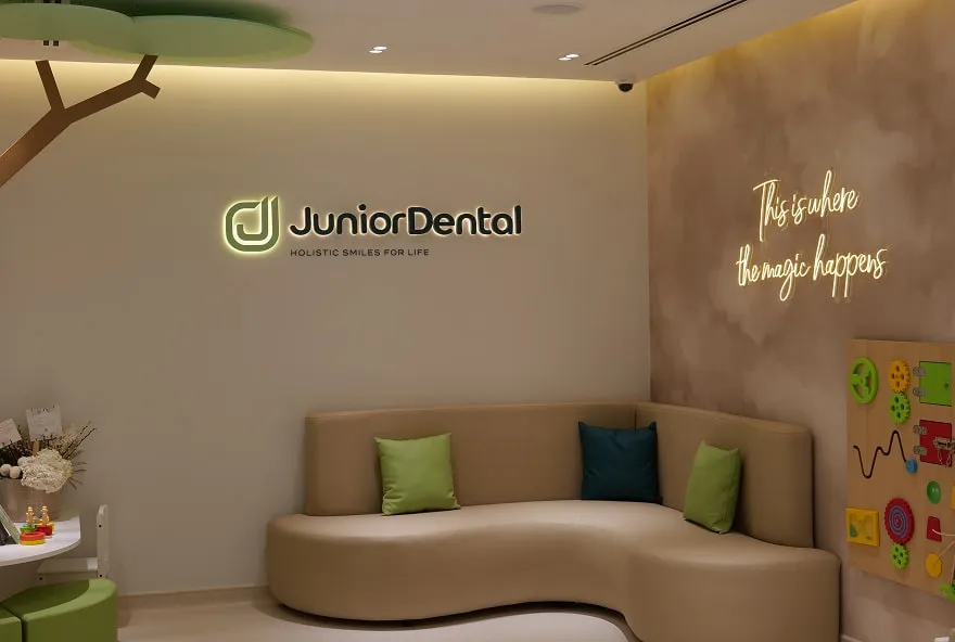 JuniorDental Dubai waiting area with the JuniorDental sign
